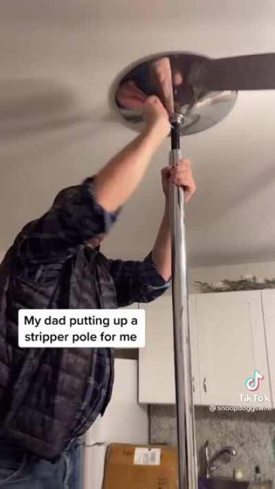 Poor dad putting up a stripper pole for his daughter