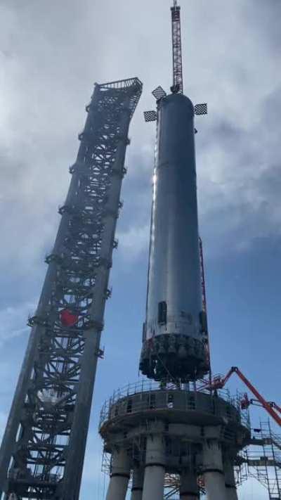 SpaceX’s SuperHeavy Booster being hoisted onto the Orbital Launch Pad🚀