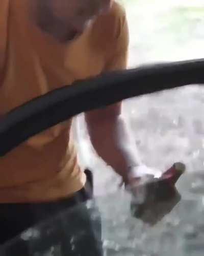 WCGW Opening a bottle of beer with your car window.