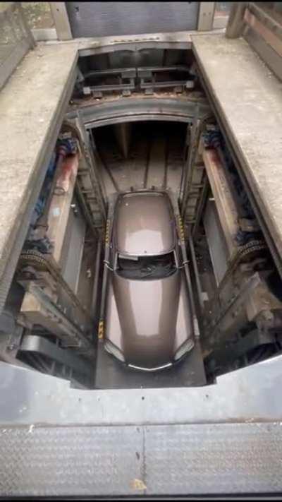 This underground garage is every man's dream garage! So amazing!