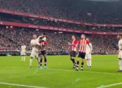 Opposition Soccer players end up piggybacking on a corner kick