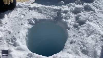 What it sounds like dropping a block of ice down a deep ice hole