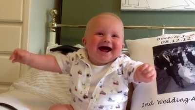 Adorable little baby laughing and freaking out as well