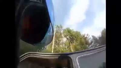 Guy hits a hits a biker