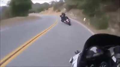 Harley driver has some pretty insane skills. That fist bump at the end.