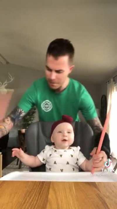 Baby plays metal music with dad