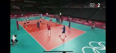 Volley-ball - French coach, Laurent Tillie, jumps to save the ball in a former player’s reflex in the last minute of the very disputed match against Poland