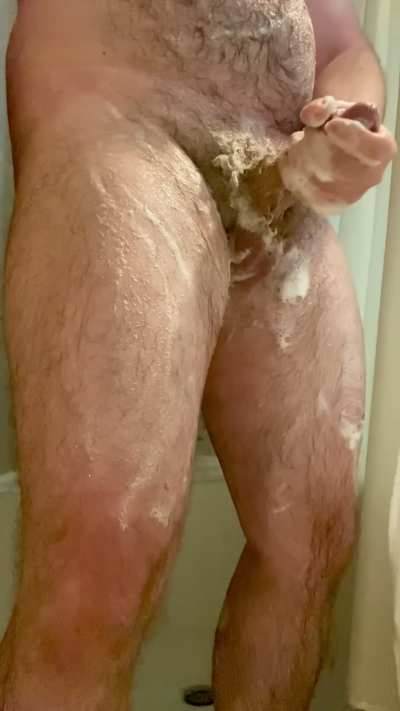 Slowly stroking my soapy body as you make me harder and harder