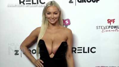 Lindsey Pelas in a very impractical dress