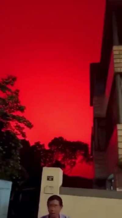 The sky over Zhoushan in China turned a bright crimson red. People reported that they observed a strange light in the sky when the sky turned red on May 7, 2022.