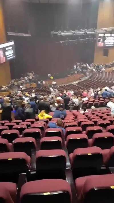 Beginning of shooting inside concert hall