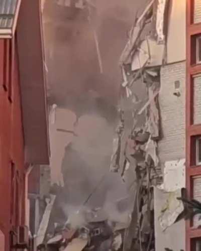 Part of the collapsed building in Dnipro after todays russian terrorist strike 