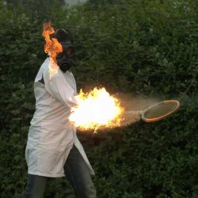 Whacking a tennis ball that's on fire