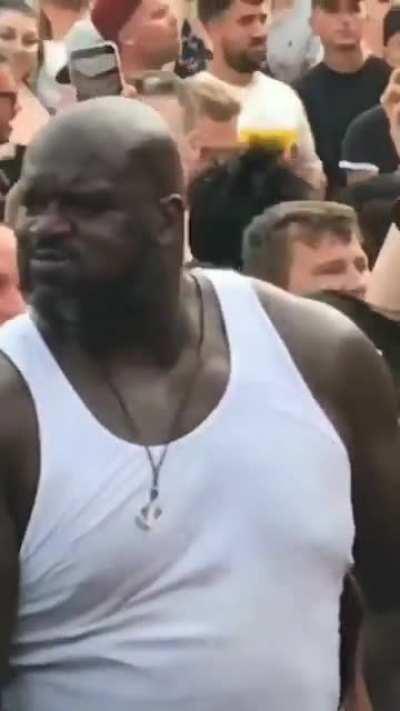 A wild Shaq at a concert