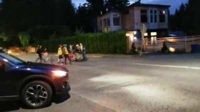 Seattle bikes block road so that rioters can march in rush hour. Local hero: &quot;Get the F--- outa my Neighborhood&quot;