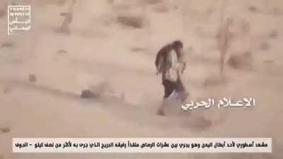 Houthi fighter moves through a hail of Saudi Coalition gunfire while carrying an injured comrade to safety on his sandals. Jawf Yemen. He survived.