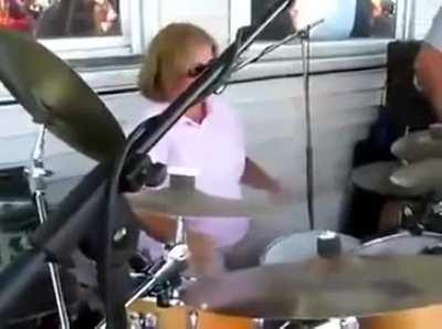 Mom absolutely shreds the Wipe Out song on the drums