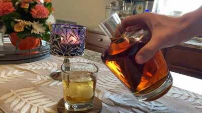 Pouring whiskey out of a decanter, and the ice cracks at the end 🧊 [unintentional]