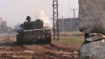 FSA forces roll out a captured T-55 to engage SAA positions in the Khan al-Assal police academy - Aleppo - 12/26/2012