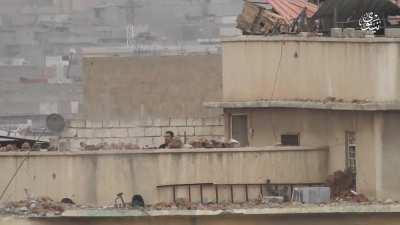 ISIS fighter sneaks onto the road and fire RPG-7 at an iraqi soldier. Mosul, Iraq, April 2017.