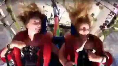 Stabilizing her friends head who passed out twice on a sling shot