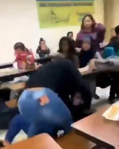 White girl bullies a muslim girl. Then a black girl comes to her defense and beats up the white girl.