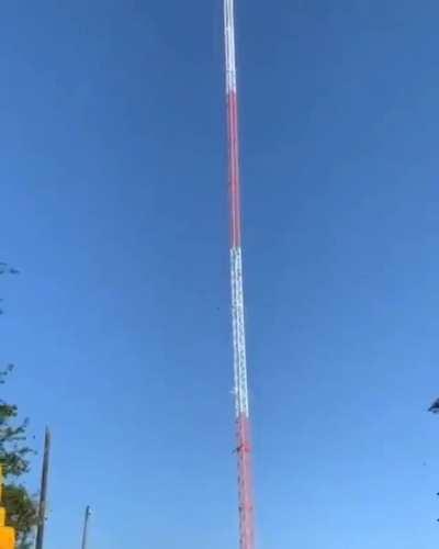 Releasing the guy wires of a broadcast tower