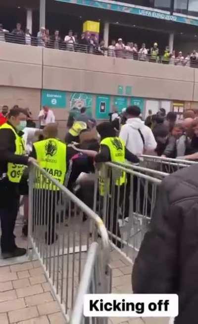 England fans storming the barriers at the Euro 2020 Final