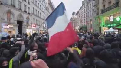 Tens of Thousands of Protesters Across France Tell President Macron: “We’ll Piss You Off”