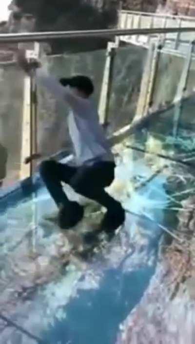 Glass walkway with special effect that appears to crack under weight