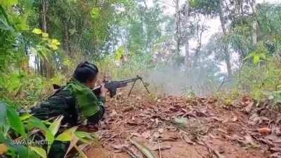 KNLA fighters with a M1918A2 BAR rifle attacking Junta forces in Myanmar.