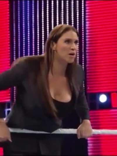 Stephanie McMahon bouncy and almost spilling out of her shirt