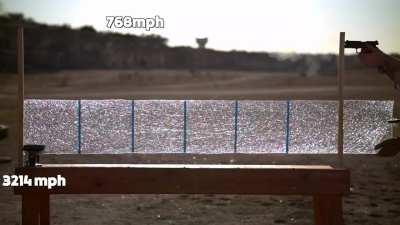 Speed of glass breaking as compared to a bullet's speed