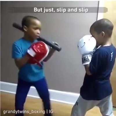 This awesome kid training with his brother