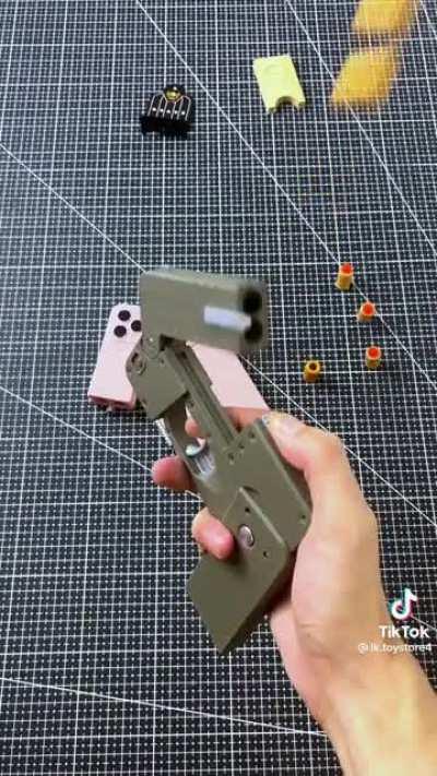 wondering if it’s possible to make something like this that shoots 22lr??? looks like a cross between a harlot and a life card in the shape of a phone case, I have little designing experience or I would try it myself