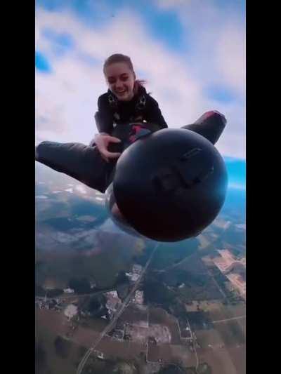 Skydiver catches a ride on a friend