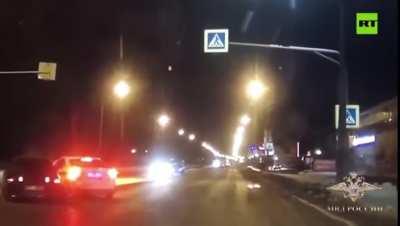 Russian traffic police use their own vehicle to protect pedestrians