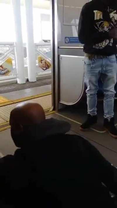 Guy on train learns the hard way about invading peoples personal space