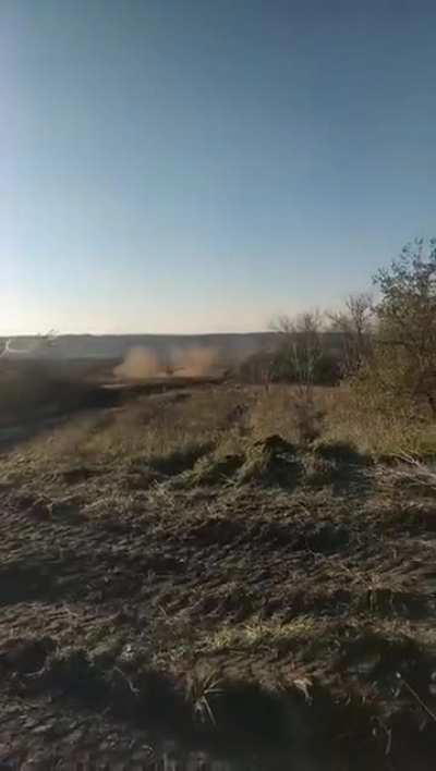 Ukrainian Mi-24s fire unguided missiles at Russian positions, which are also simultaneously fired on by artillery.