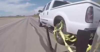 Police deploy grappler to stop this car.