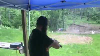 AK-47 muzzle blast deflecting rain