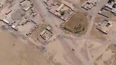 Drone footage by IS showing an up-armoured SVBIED attacking an Iraqi convoy near al-Kanisa village, West of Mosul. As it approaches, the SVBIED is repeatedly strafed by an Iraqi Bell helicopter.Dated: June 17, 2017