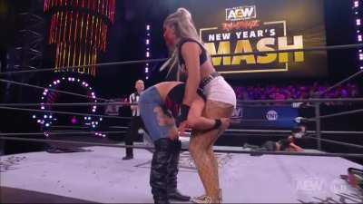 Penelope Ford crotches herself on the top rope and Allie does the splits into thumbtacks