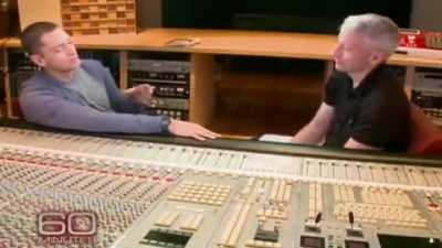 Eminem proves there are plenty of words that rhyme with “orange” in an interview 2011