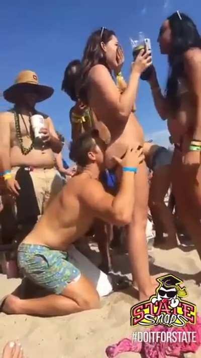 She lets him eat her ass on a very public beach