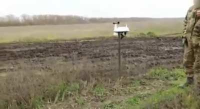 Ukrainians preparing and firing rockets loaded with written instructions for surrendering in Bakhmut