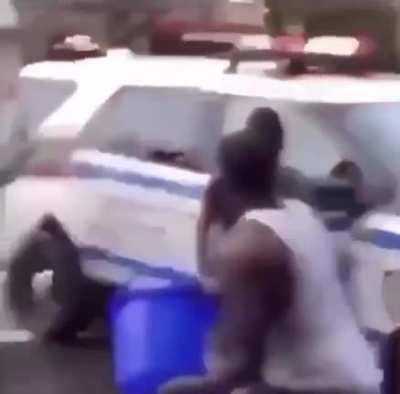 This lady calls the cops on people having a water fight and their response is just well satisfying!