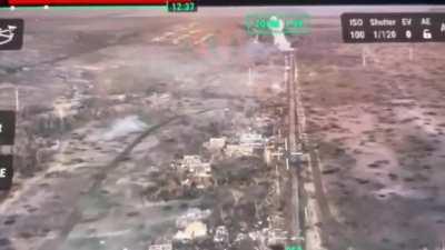 Ukrainian aerial scouts record and comment on the work of an M2A2 ODS-SA Bradley of the 47th Separate Mechanized Brigade attacking Russian positions in the village of Berdychi in the Avdiivka direction, Donetsk Oblast.