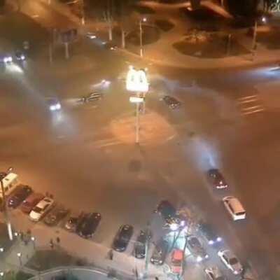 driver drifts around roundabout just to park his car