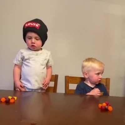 The video of these babies communicating without a single word is everything.